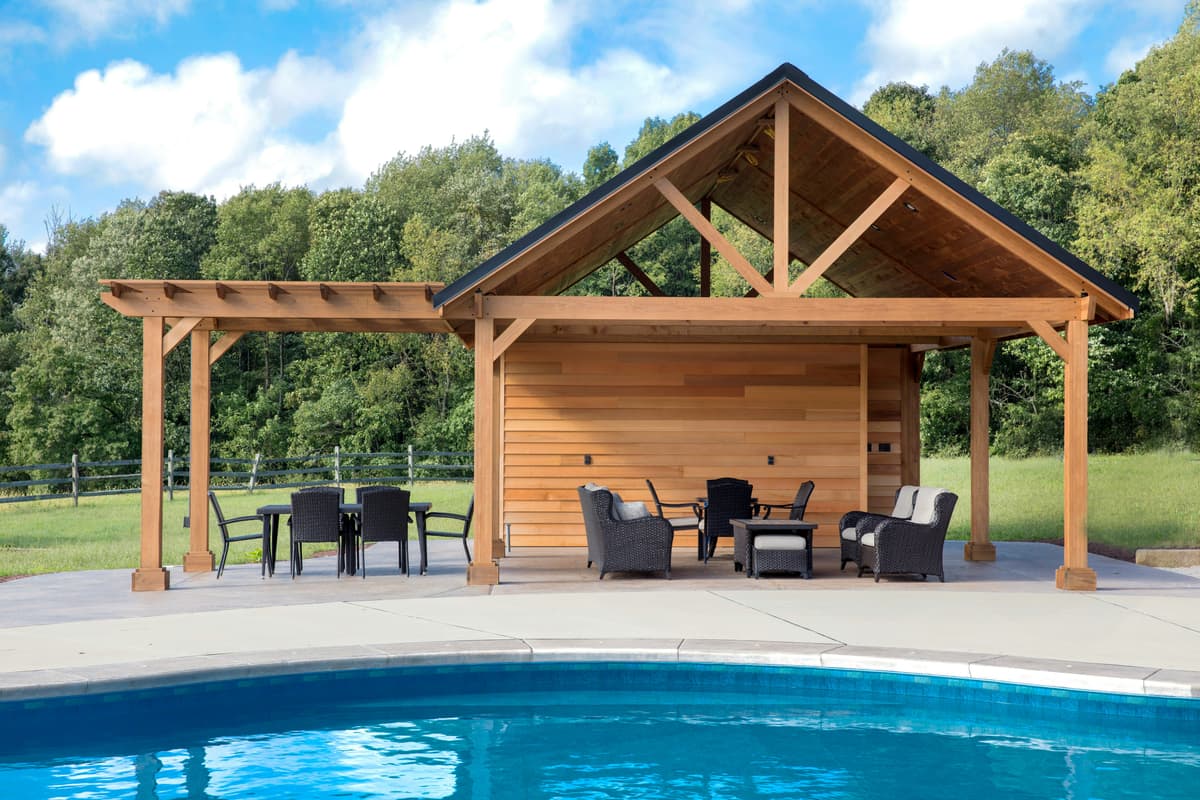 Timber pool pavilion with an attached open pergola