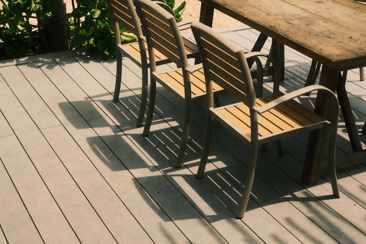 New deck set up with an outdoor dining table and chairs